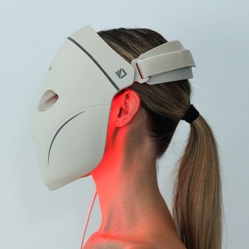 Side view showing the off-the-skin fit of the Dermalux LED Face Mask